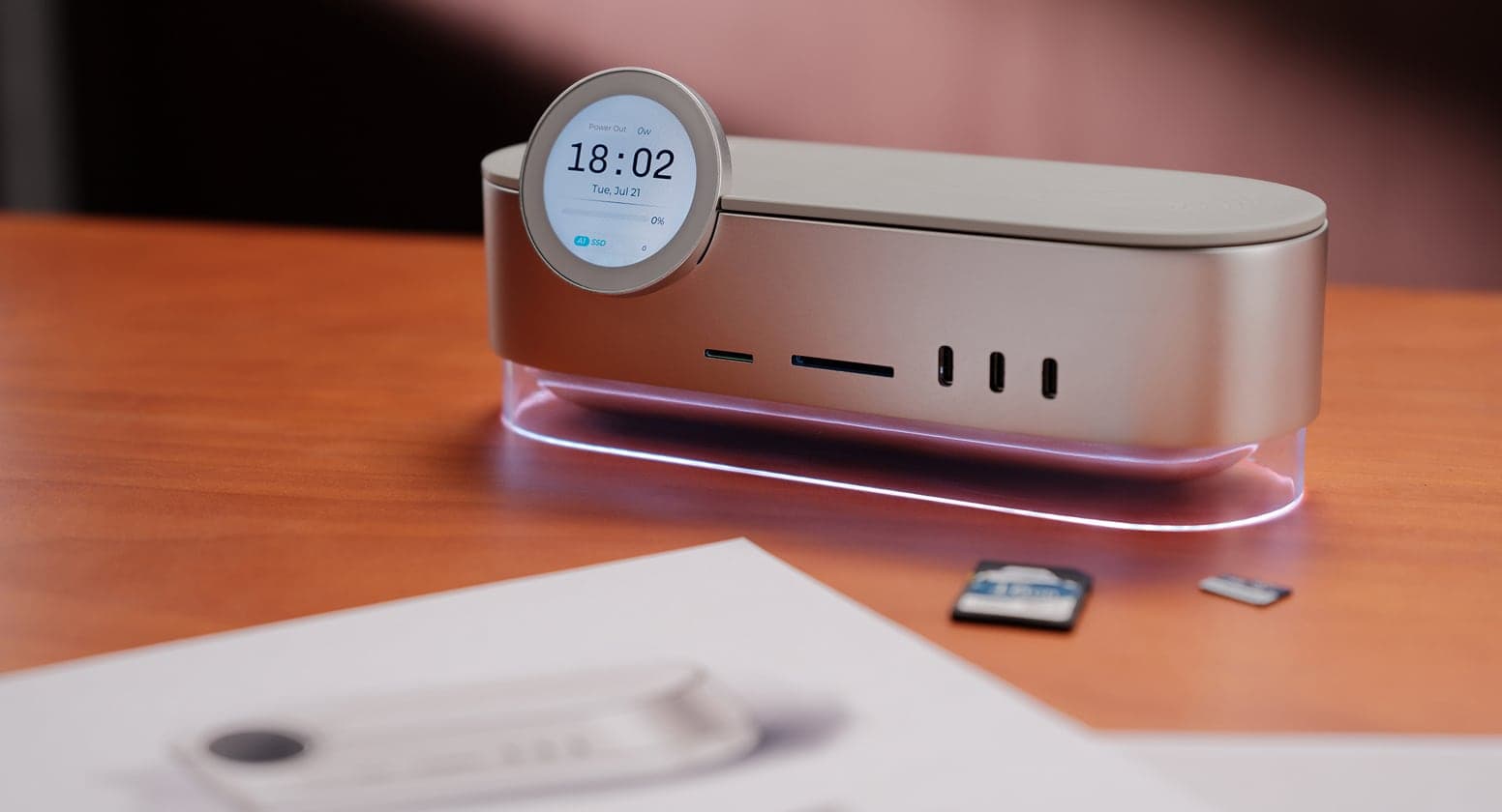 Muzim L1 smart docking station with a circular display and front-facing ports